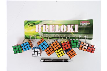 BRELOK x 12 kostka kol., plast.,            fol.