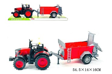 TRAKTOR z rozrzutnikiem obornika pod kloszem