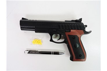 PISTOLET sprężynowy NA KULKI OMEGA 20 cm,     fol.