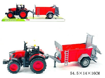 TRAKTOR z rozrzutnikiem obornika pod kloszem